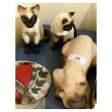 Three Cat Figures