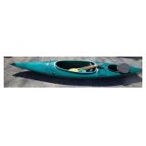 Green Kayak and Paddle