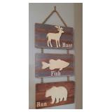 Decorative Sign and Raccoon Picture
