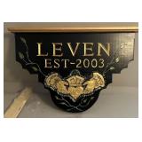 Decorative Wood Shelf W/ "Leven" Inscription