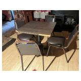 Table W/ 4 Brown Chairs