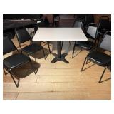 White Table W/ 4 Black Chairs