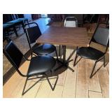 Table W/ 4 Black Chairs