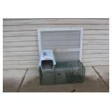 Live trap, pet taxi & metal grate Live trap, pet taxi & metal grate