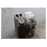 2 metal 5 gal. gas cans 2 metal 5 gal. gas cans