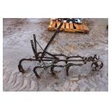 Antique steel walking cultivator Antique steel walking cultivator