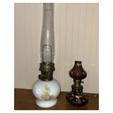 Two oil lamps one is Aladdin