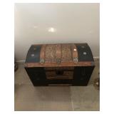 Dome top trunk with bows and ribbon