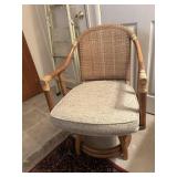 Two swivel bamboo framed patio chairs