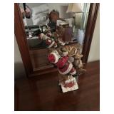 Santa riding a reindeer