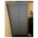 Four door wooden storage cabinet