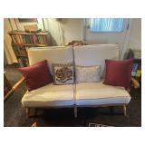 Wood framed loveseat with cushions