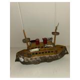 Early metal toy boat