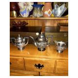 Three piece tea set silver plate, China design