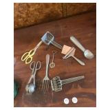 Plastic container with kitchen utensils