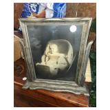 Early picture frame with baby picture