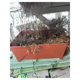 Garden tools, flower pots, wooden shelf