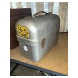 Metal lunchbox with cutters and oil can