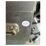 Craftsman metal toolbox with saws, drill, and bits