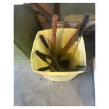 Trashcan with hedge, trimmers, and pruners
