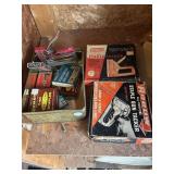 Three staplers and staples