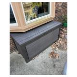Hard plastic deck box - contents go with patio set