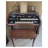 Double pedestal organ, stool, music