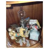 Cabinet contents, decorative birds, nativity, lamp