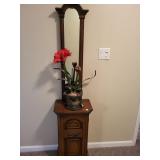 Hall cabinet with mirror and artificial plant