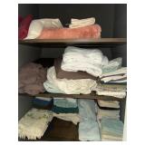 Towels & sheets in closet