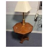 Octagon table and brass lamp