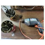 Black & Decker drill and a Folgers can full of