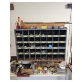 Large bolt cabinet mounted to wall & contents