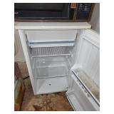 White dorm size refrigerator