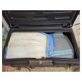 Tough bin plastic bed tote with several packing