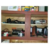 Several volt meters in cabinet