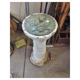 Outdoor sun dial small damage on bottom