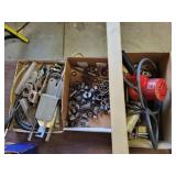 Three boxes, tools, metal pieces, and hairdryer