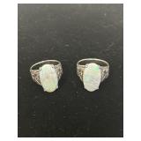 Two opal rings, unmarked, silver color mounting