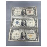 1928 a one dollar silver certificate, 1935 a one
