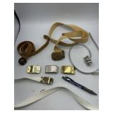 Belts, brass belt buckles.