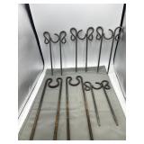 4 11' tall and 2- 15ï¿½ tall cast iron garden