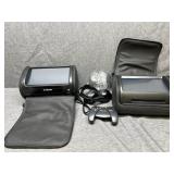 Two XTRONS VIDEO GAME SYSTEMS, headphones,