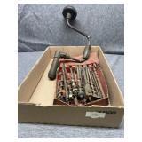 Hand drill and several bits