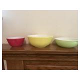 Three Pyrex mixing bowls