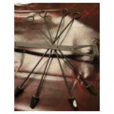 Metal branding iron rods welded together with