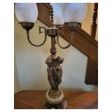 Brass triple lamp with ladies