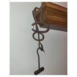 Three vintage iron hay hooks