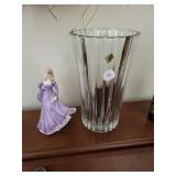 Large vase and girl with hat