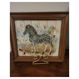 Framed puzzle of a zebra with brass display stand